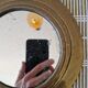 Round brass mirror