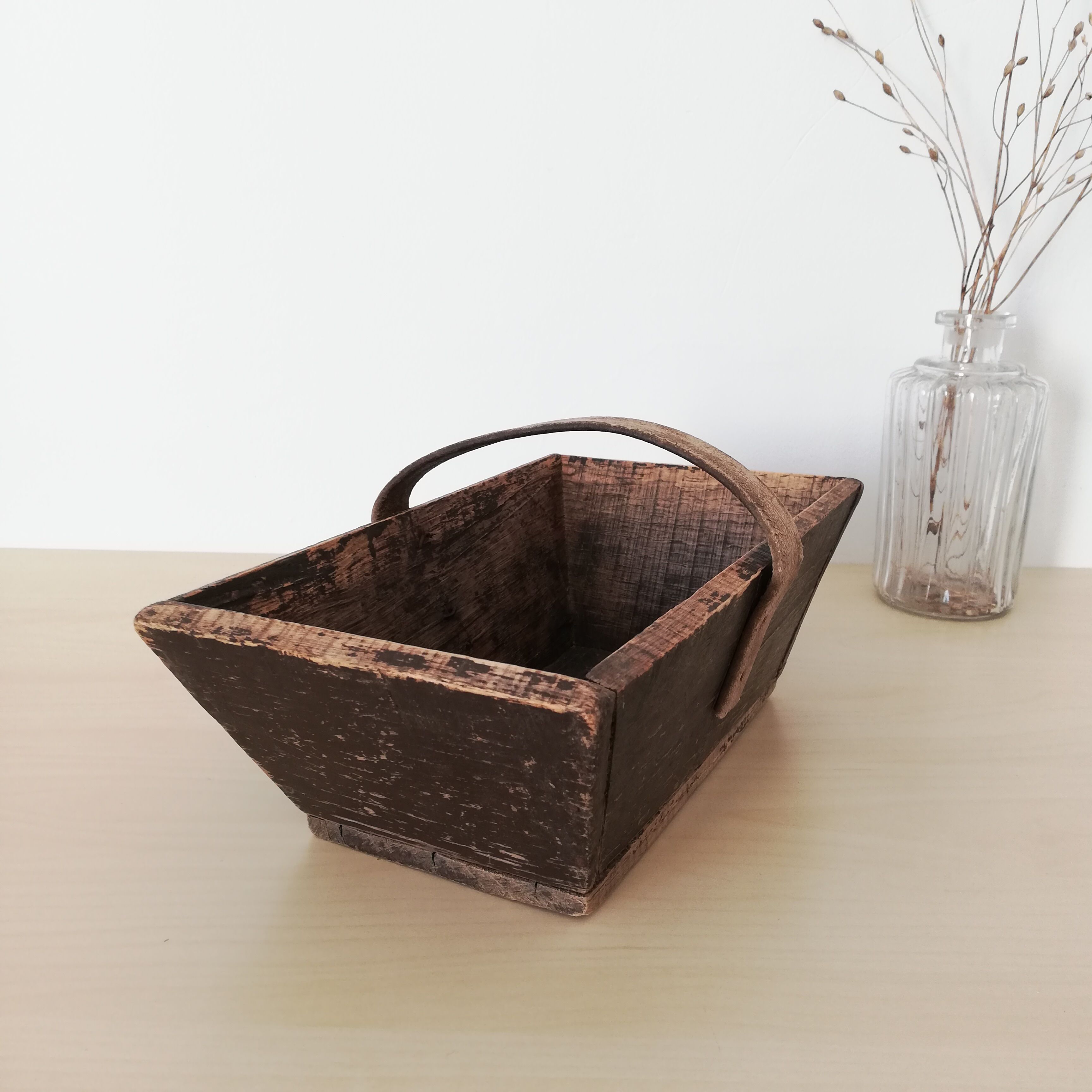 Dark wooden harvest basket