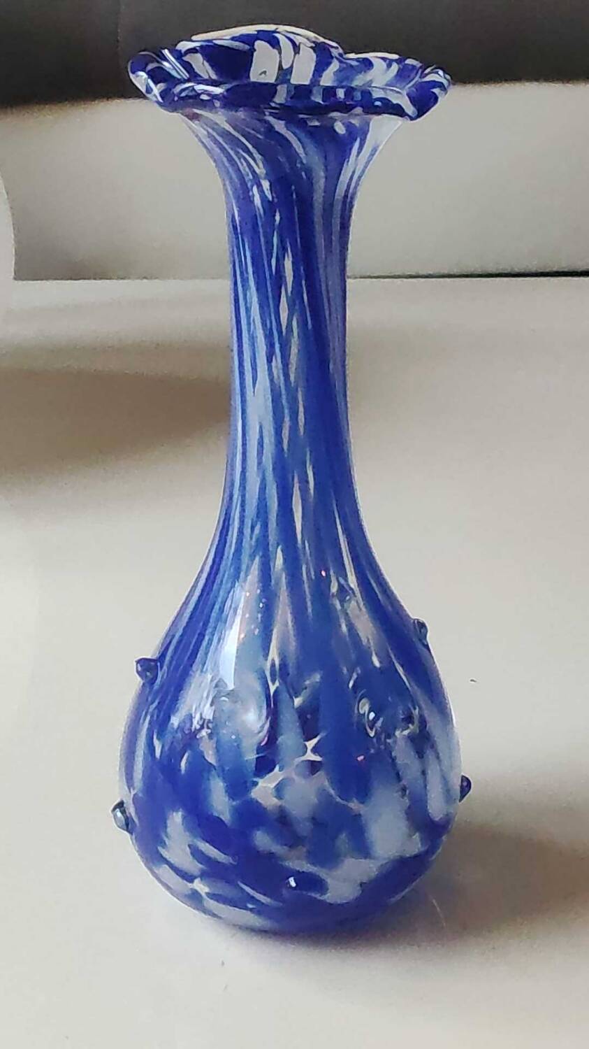 Murano style floral vase. Corolla neck, speckled cobalt blue & white. Dim 24 x 10 cm