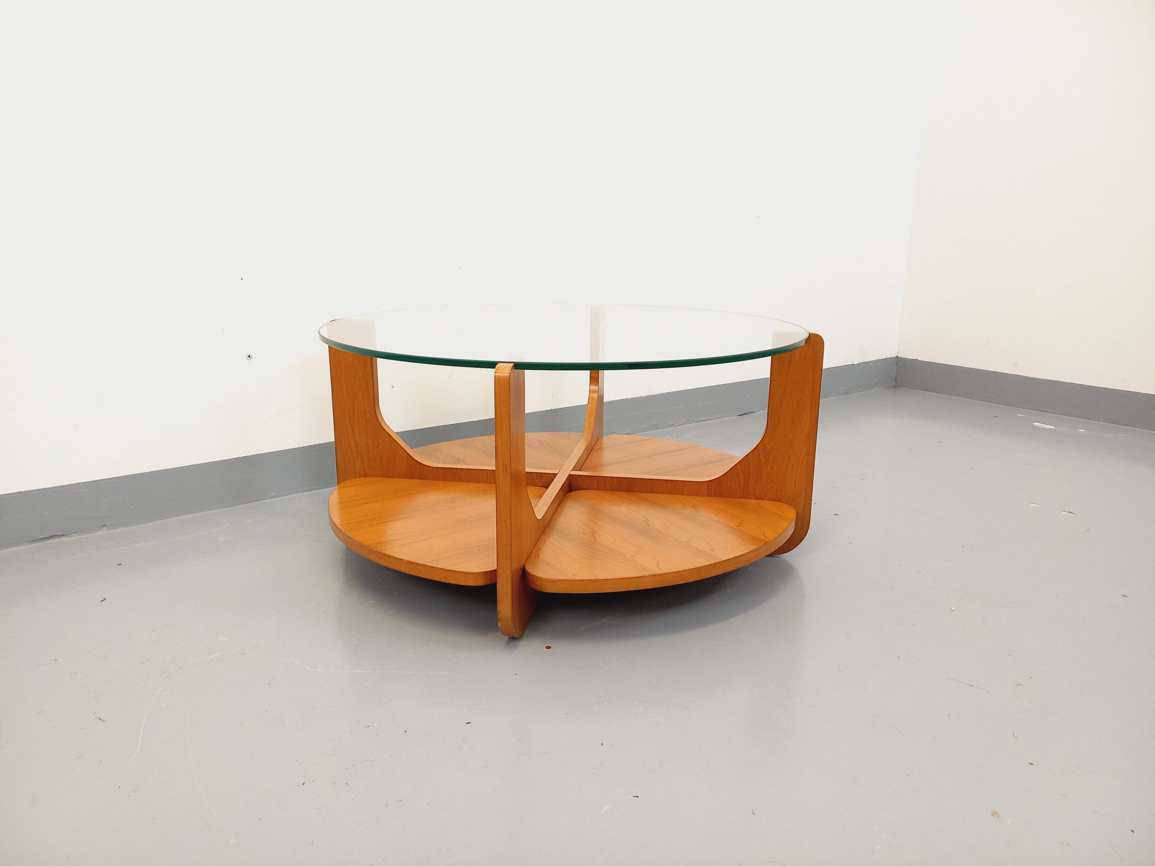 Vintage round coffee table with 2 tops by Hugues Poignant, in teak and glass