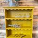 Renovated old saffron wall shelf