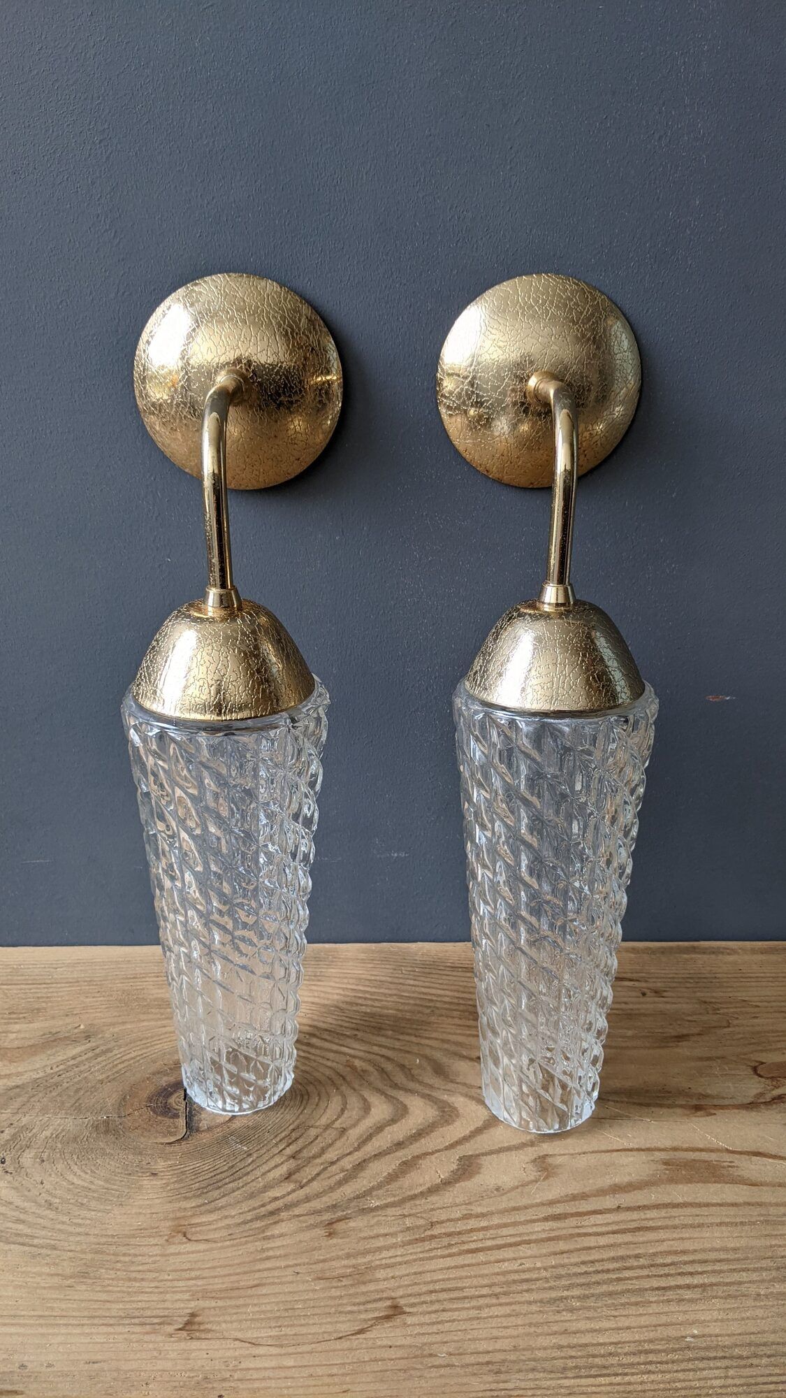 Old pair of vintage wall lamps gold metal and glass
