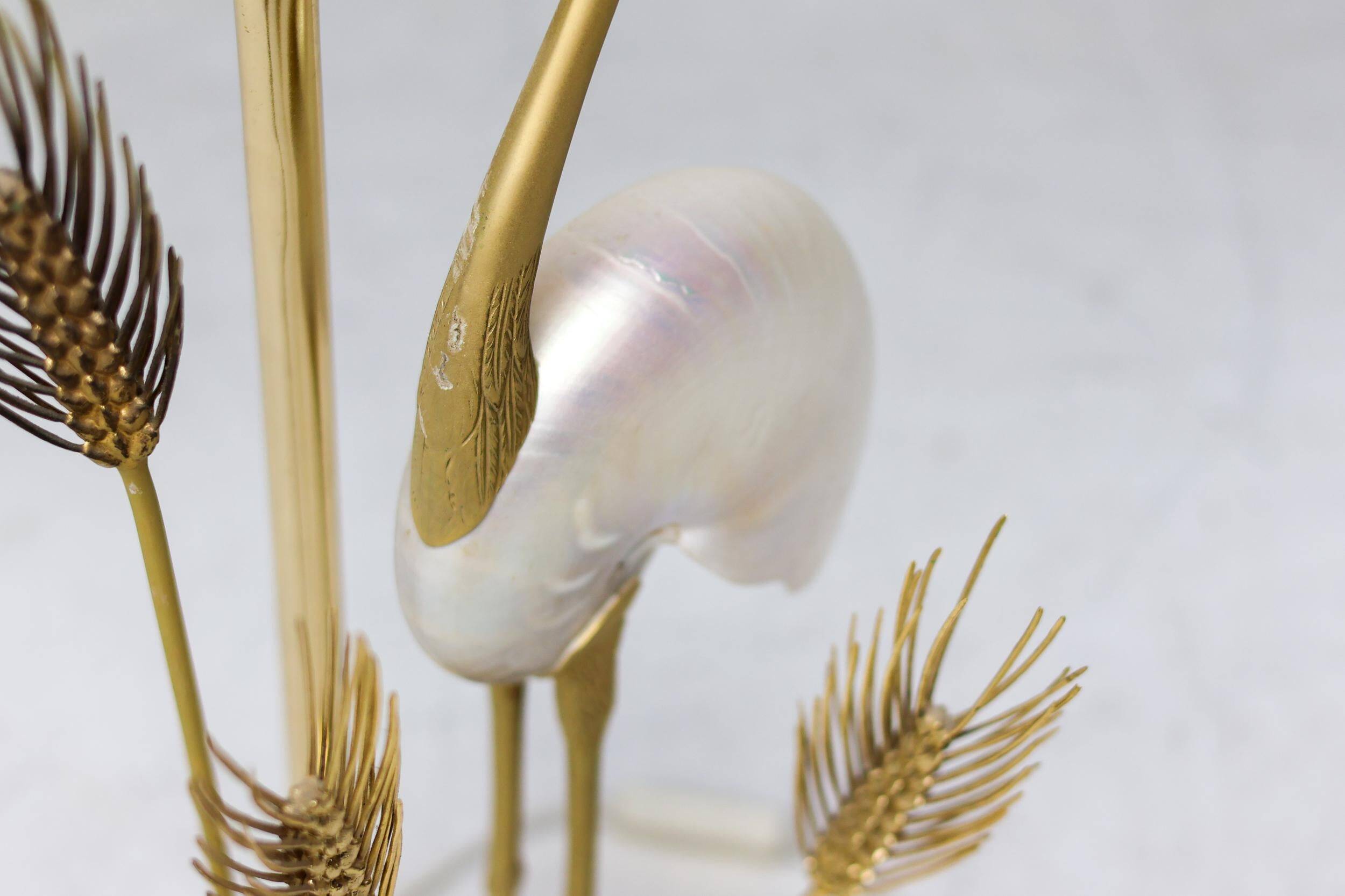 Monumental crane or egret lamp post in gilded brass by Antonio Pavia