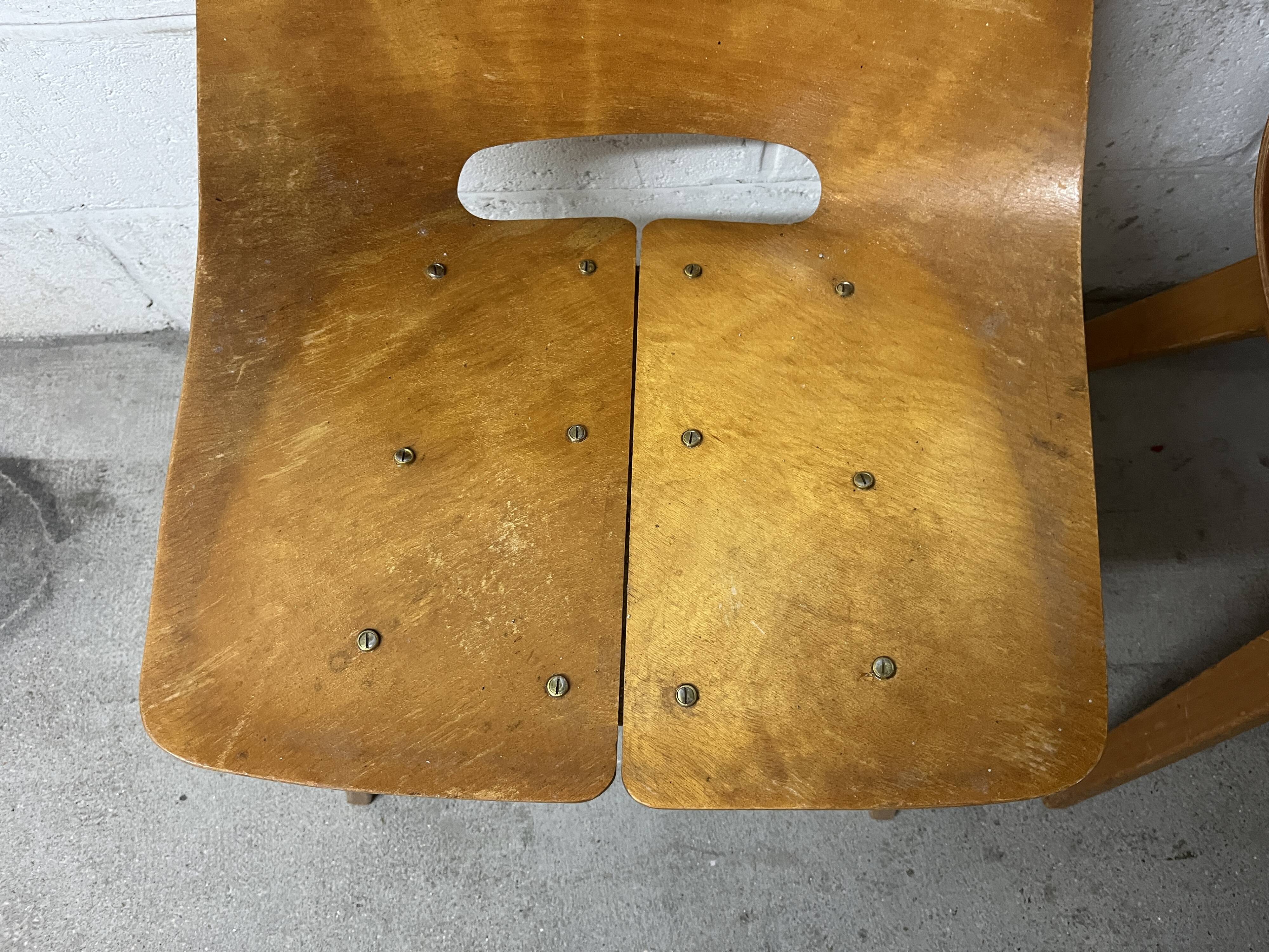 Pair of Tonneau chairs by Pierre Guarriche