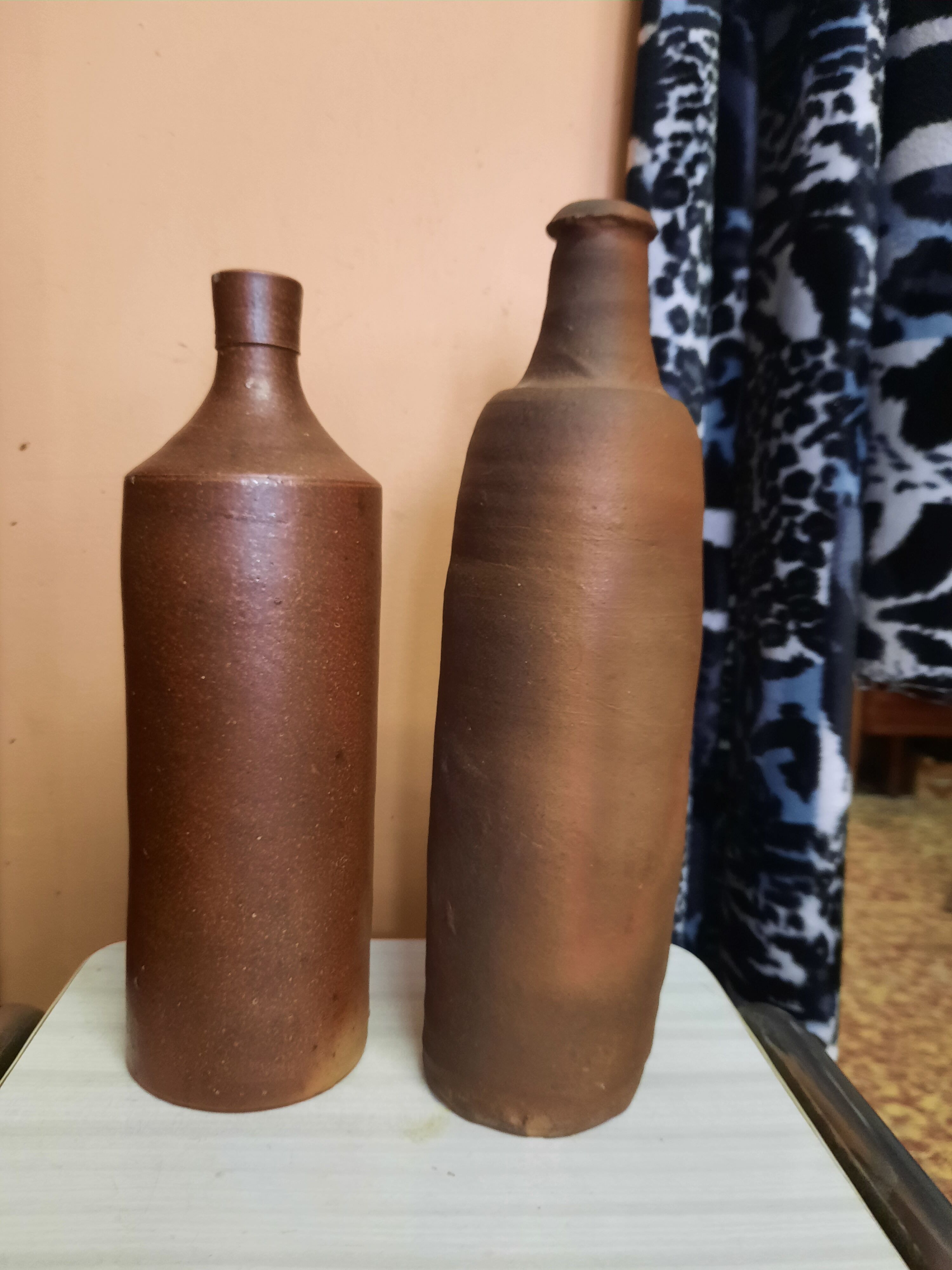Duo of raw stoneware bottles