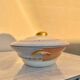 Antique Limoges porcelain soup tureen with two decorations.