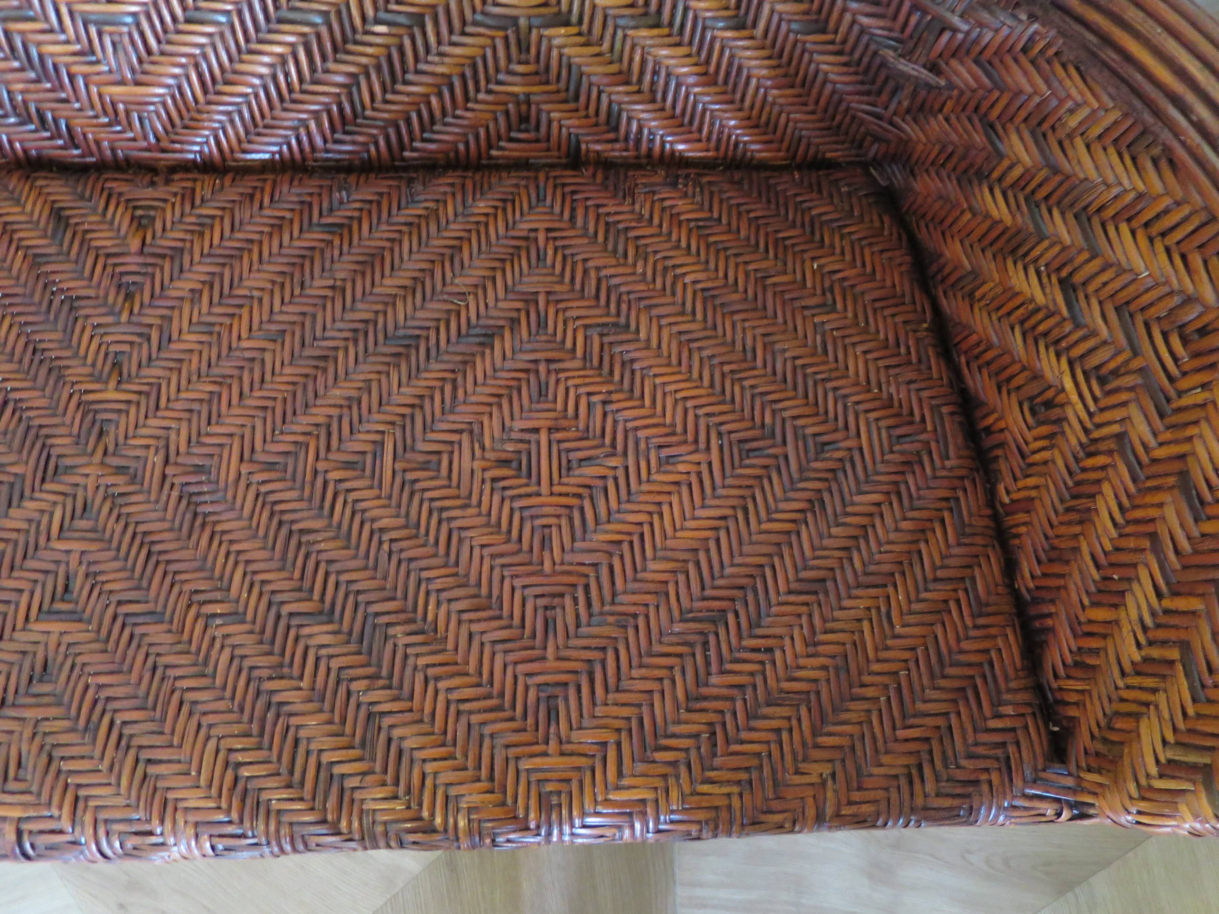 Two-seater banquette in woven rattan, wood and bamboo, 1980s.