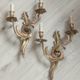 Pair of original antique bronze wall sconces.