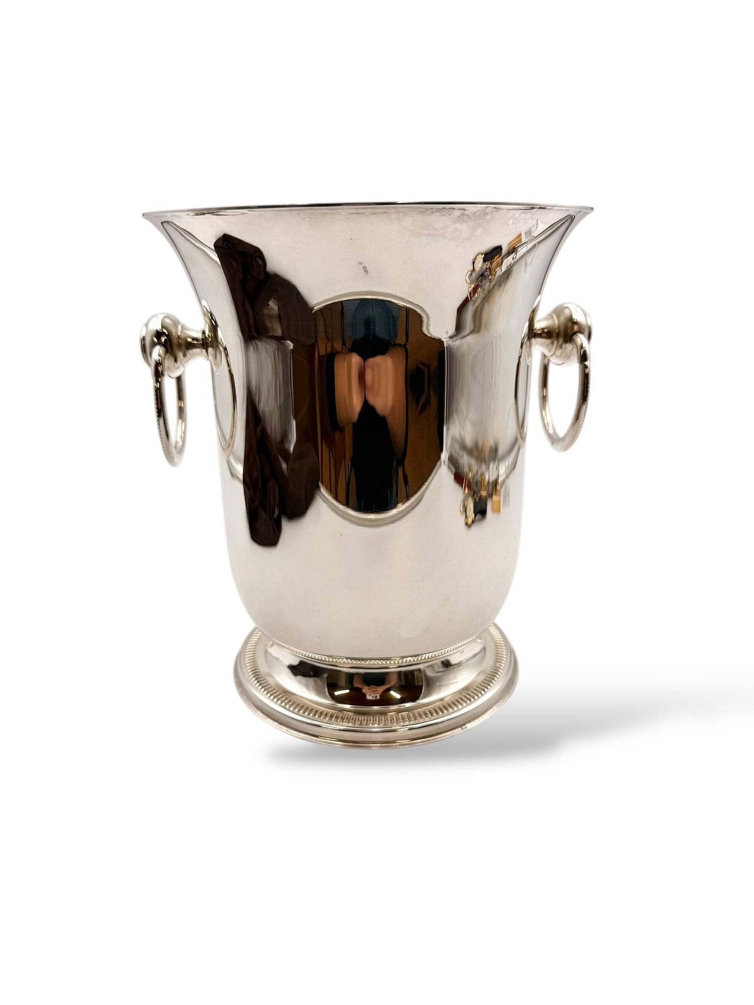 Silver-plated champagne bucket with ring handles.