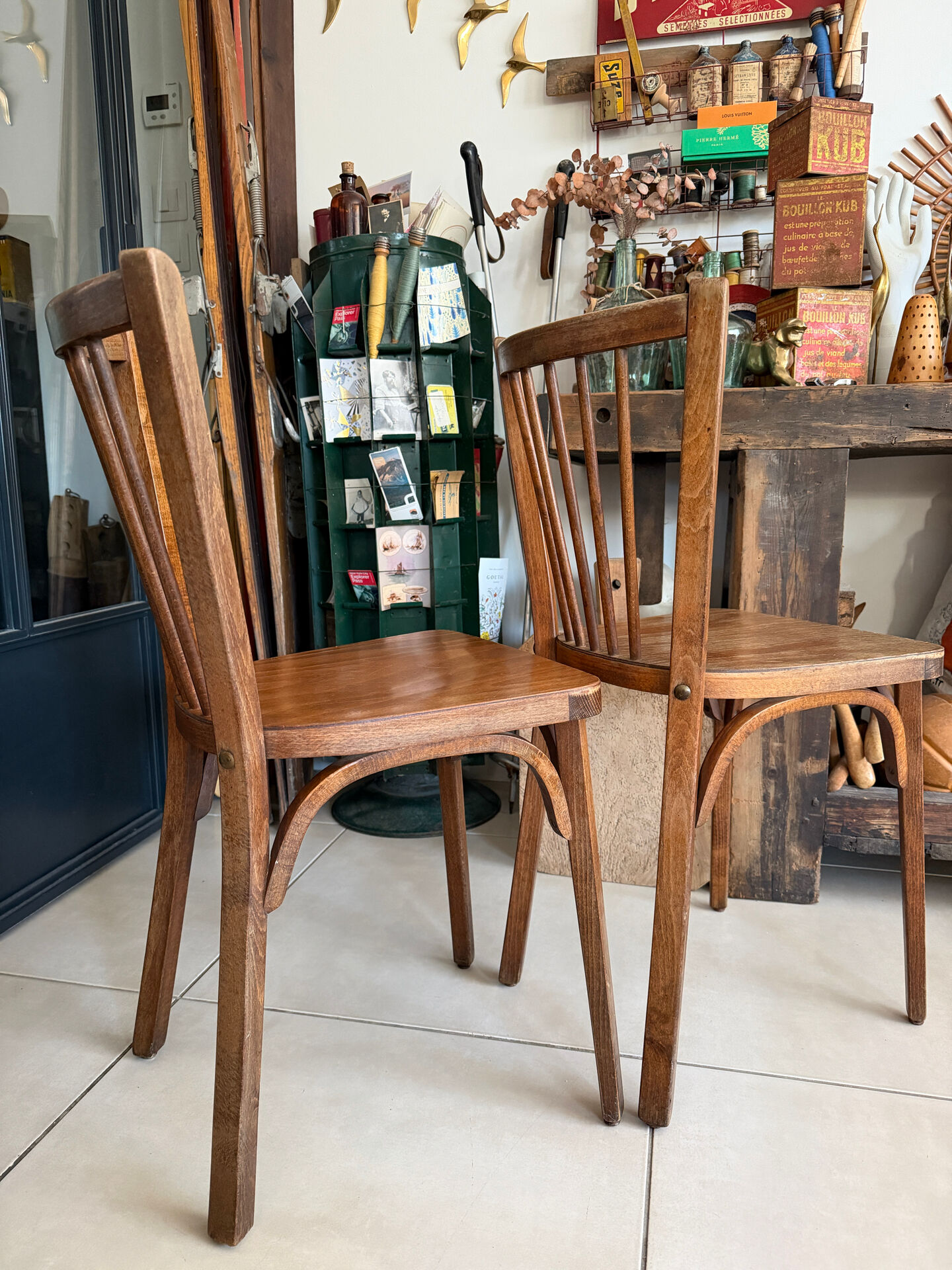 Pair of vintage Baumann bistro chairs in wood.