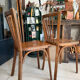 Pair of vintage Baumann bistro chairs in wood.