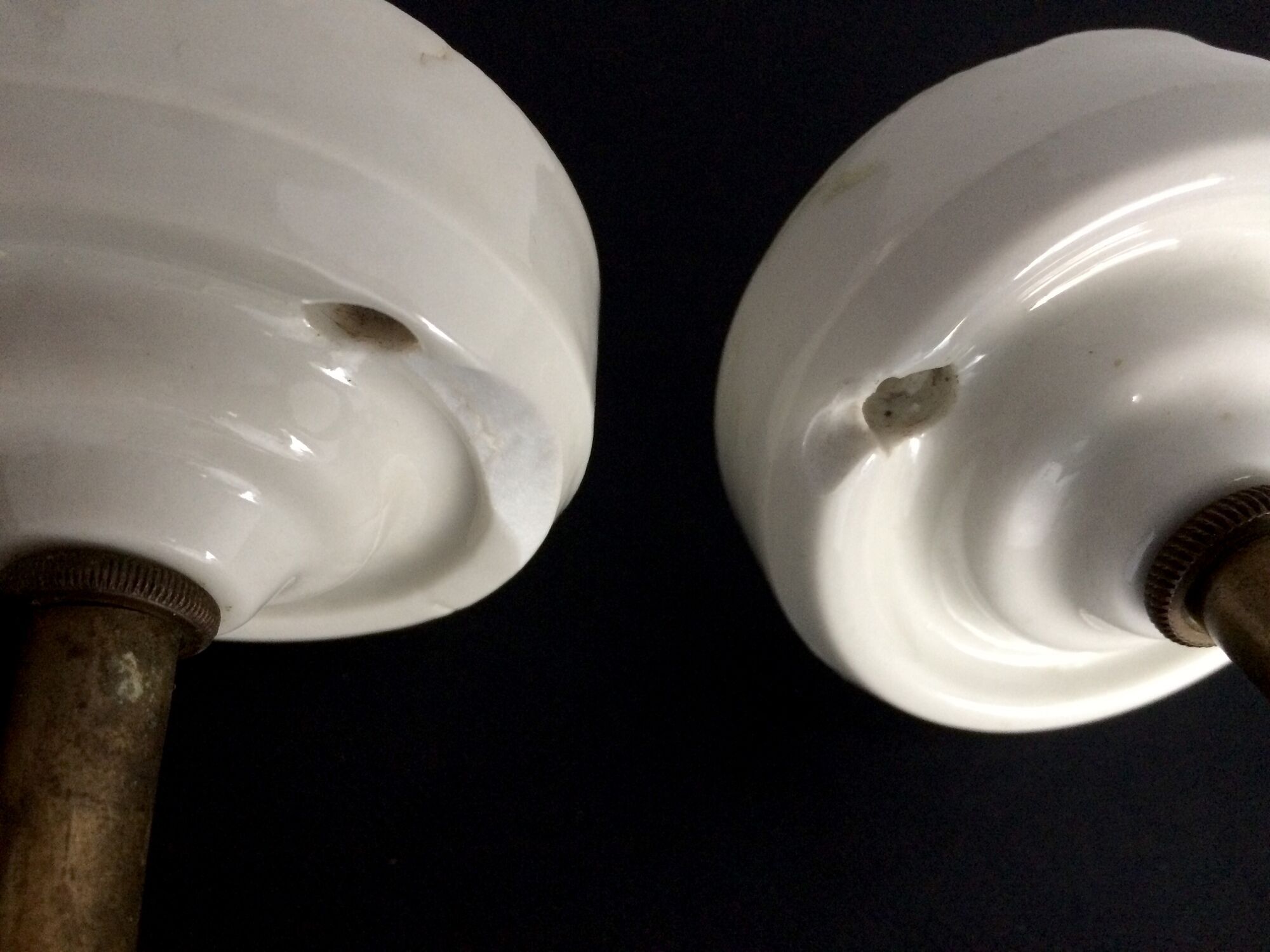 Pair of brass swan collar wall sconces, porcelain fastening. Vintage