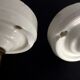 Pair of brass swan collar wall sconces, porcelain fastening. Vintage