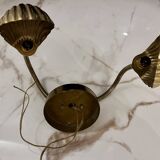Articulated shell wall light