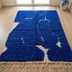 Handmade pure wool rug with blue patterns, 150/250 cm.