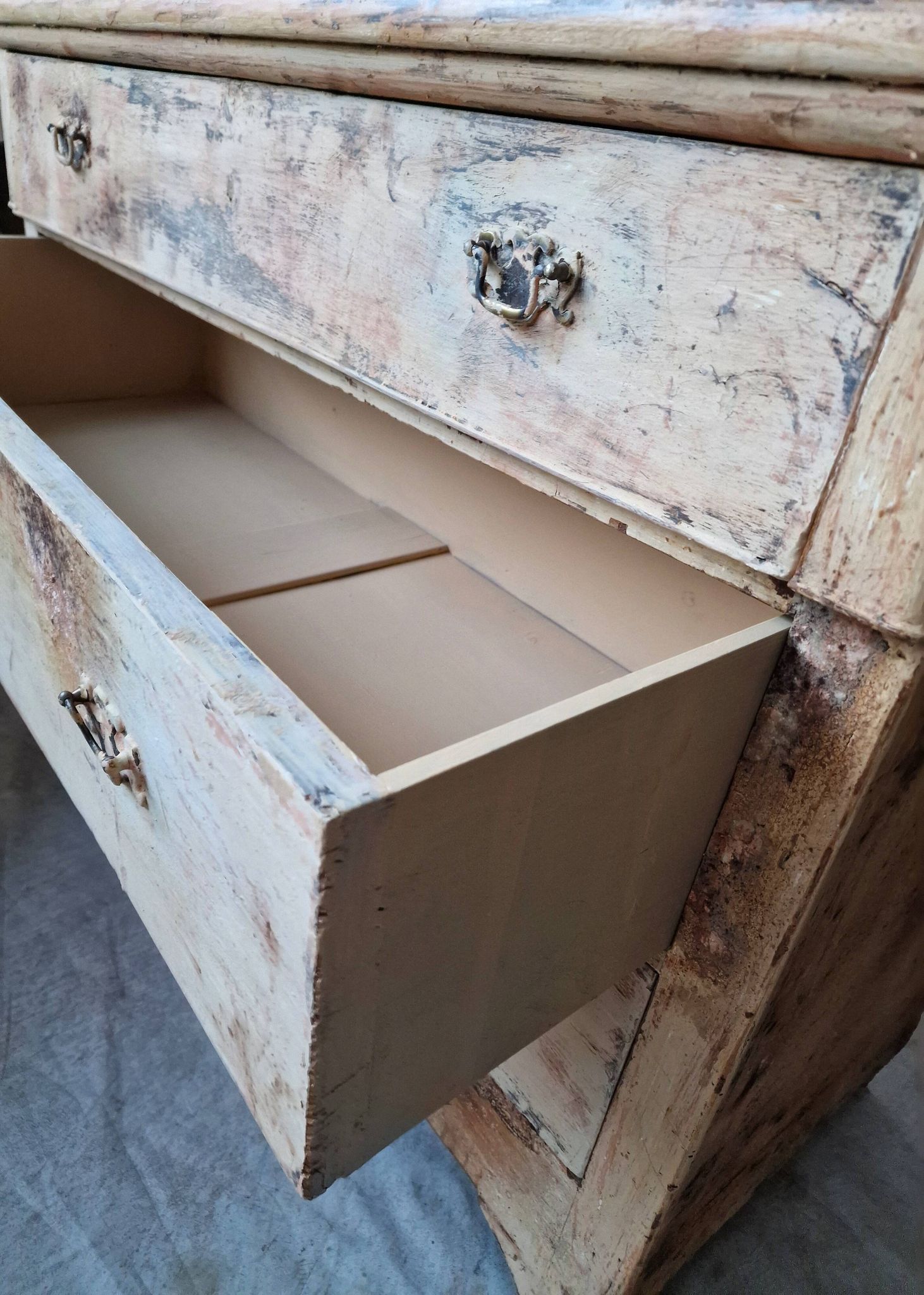 Antique patinated chest of drawers