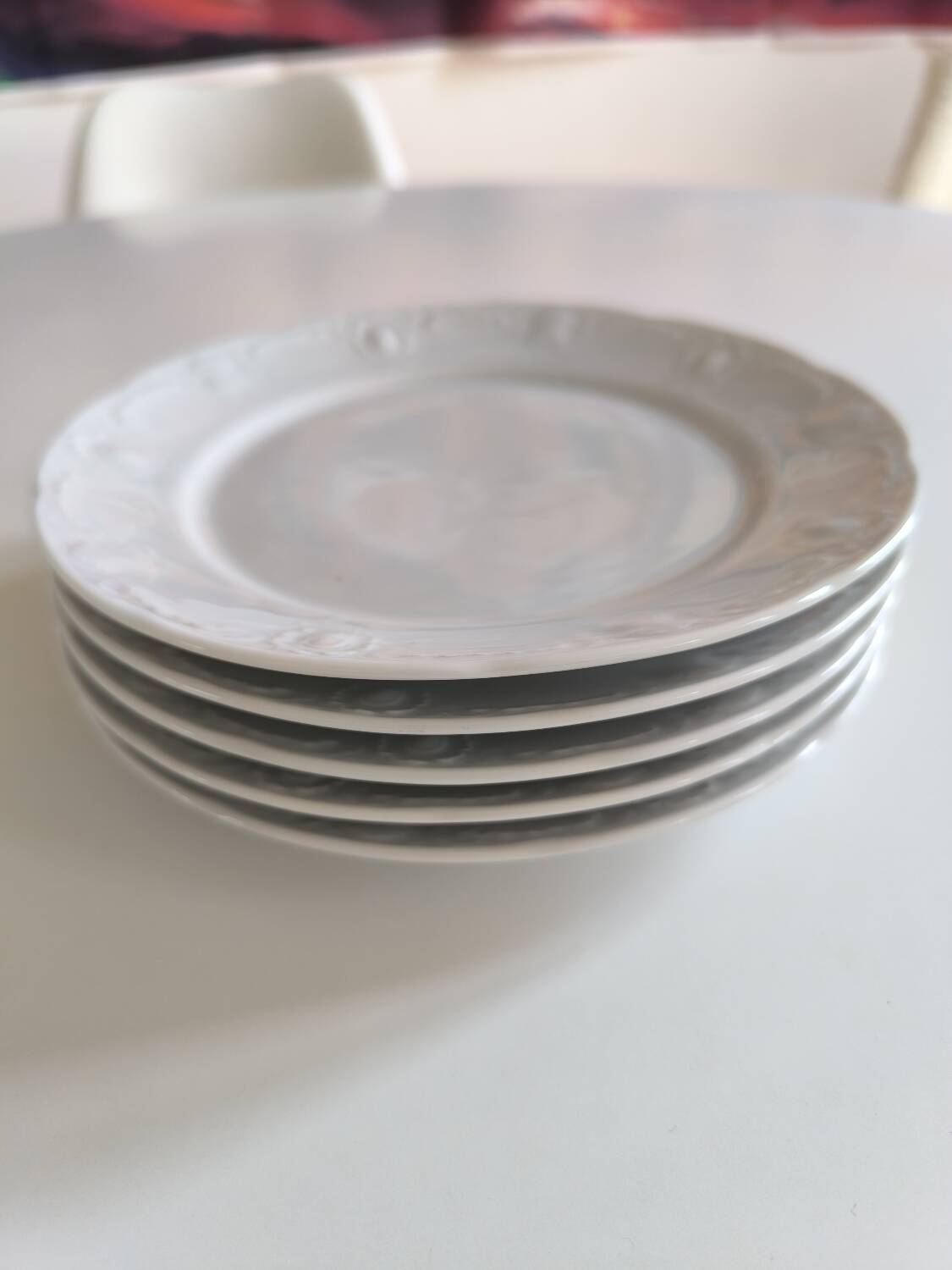 Set of five porcelain dessert plates