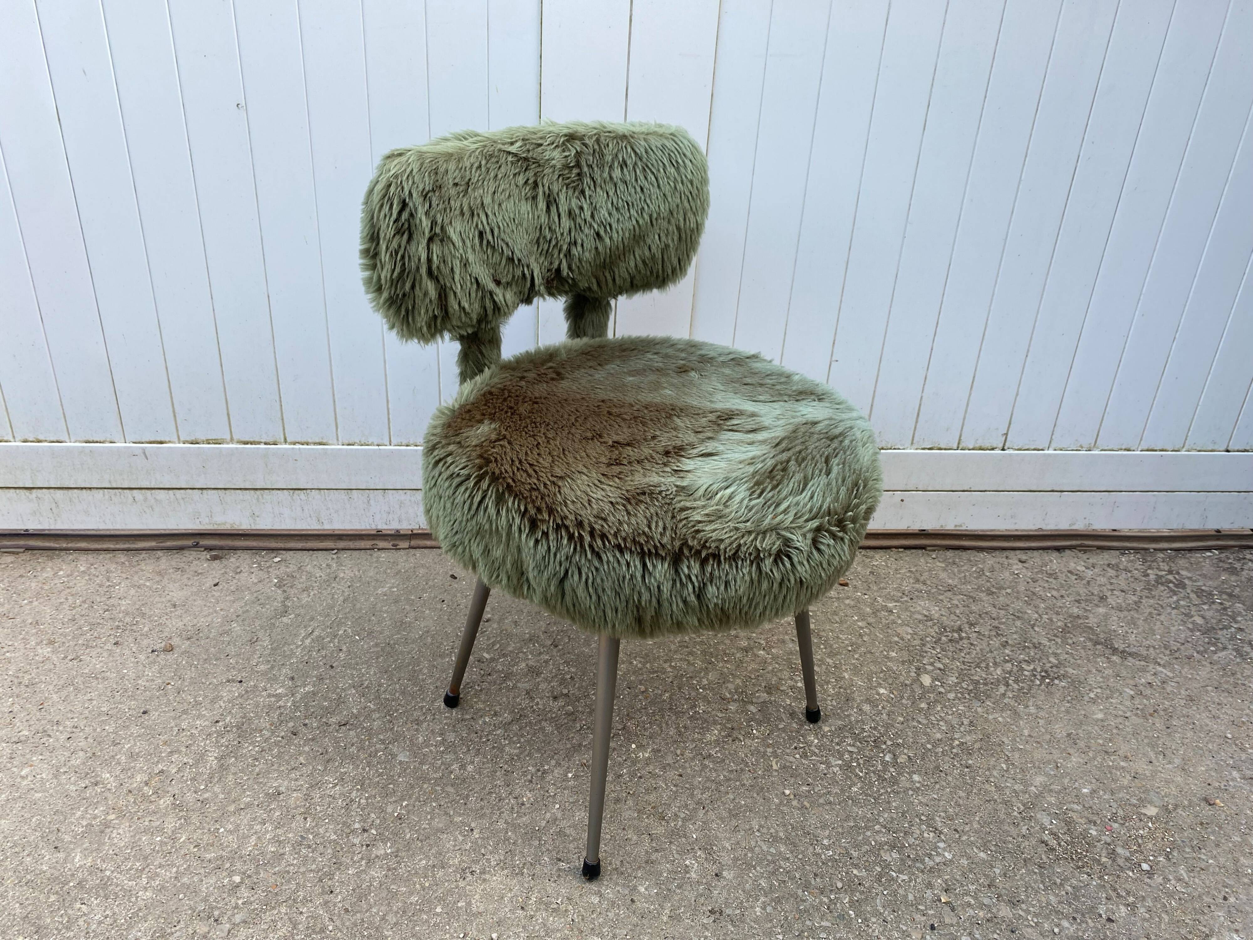 Vintage green furry chair from the 1960s