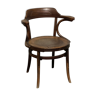 Curved wooden armchair