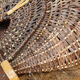 Rattan braided fishing basket