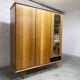 French wardrobe with tapered legs, 3 doors, 1 mirror (27*130), and 1 drawer.
