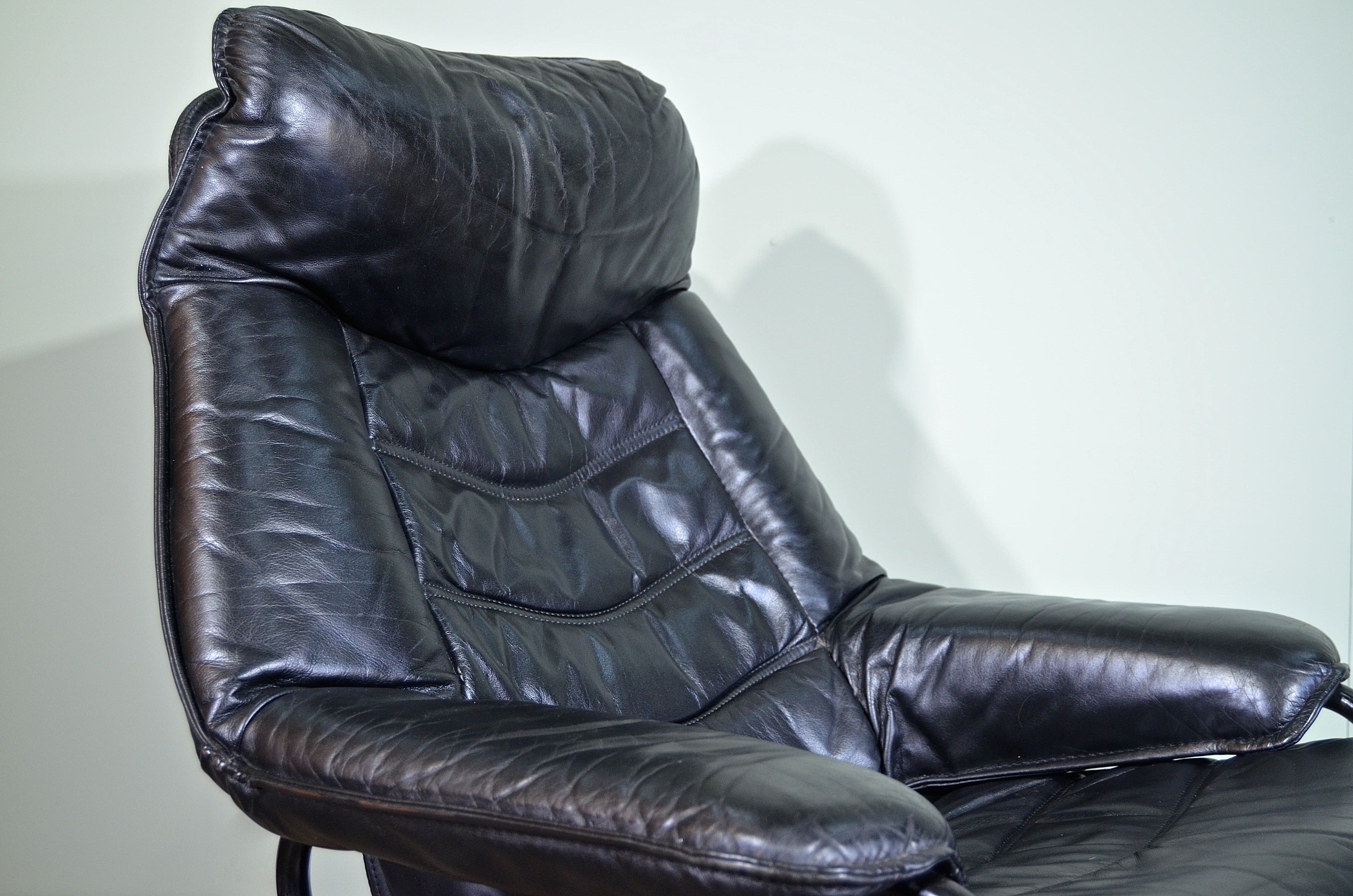 Norwegian Skoghaug industries vintage black leather swivel reclining chair