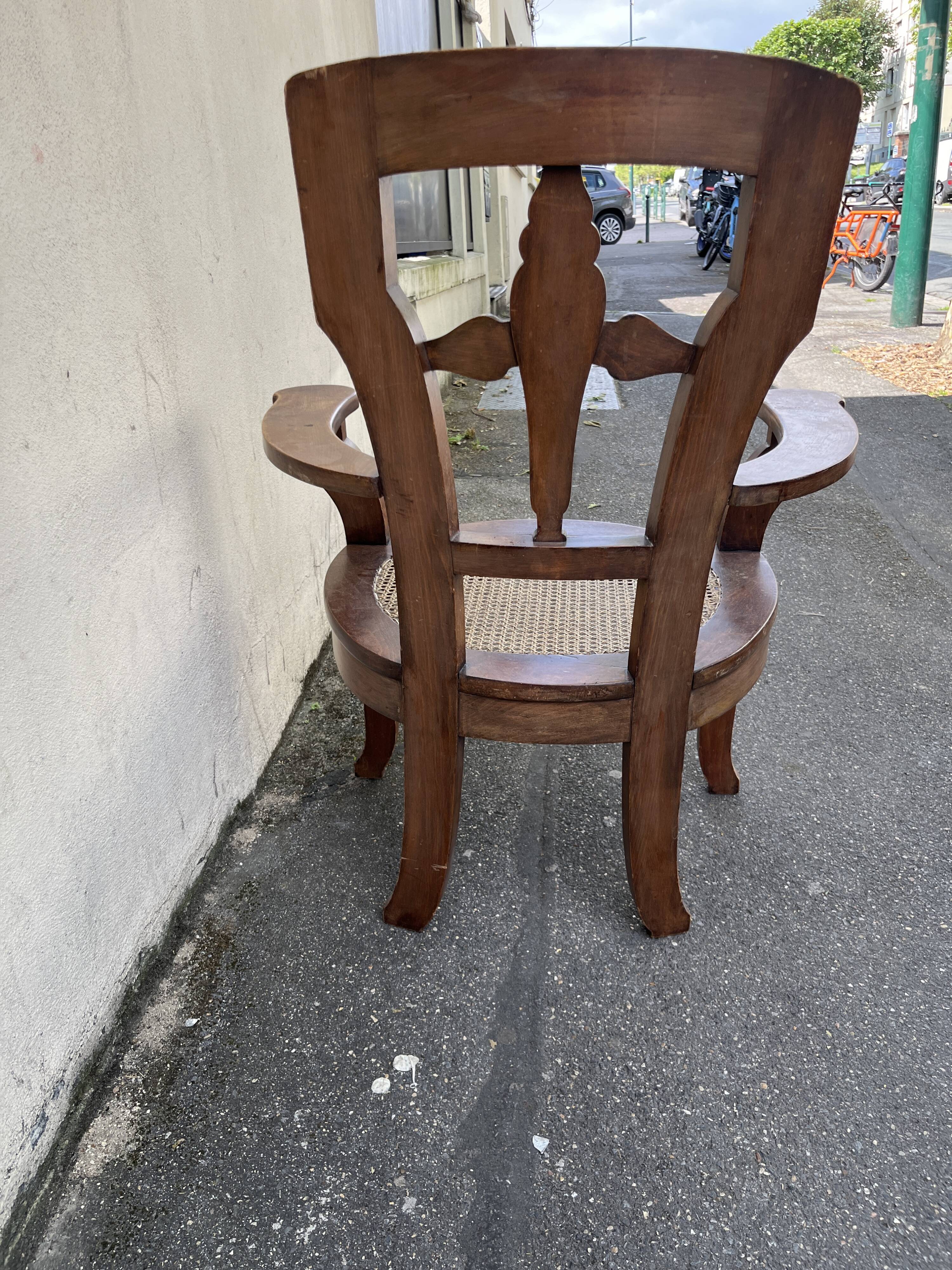 Large caned armchair