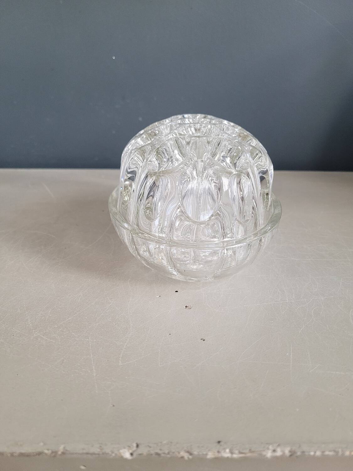 Large molded glass flower holder