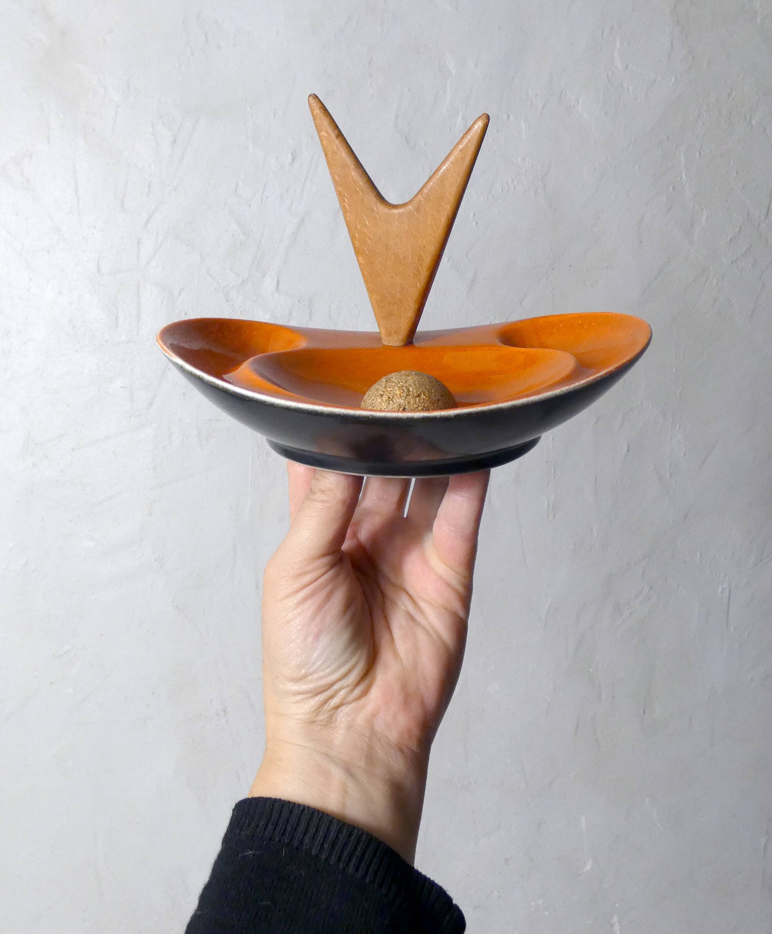 old ceramic and asymmetrical wood pipe ashtray