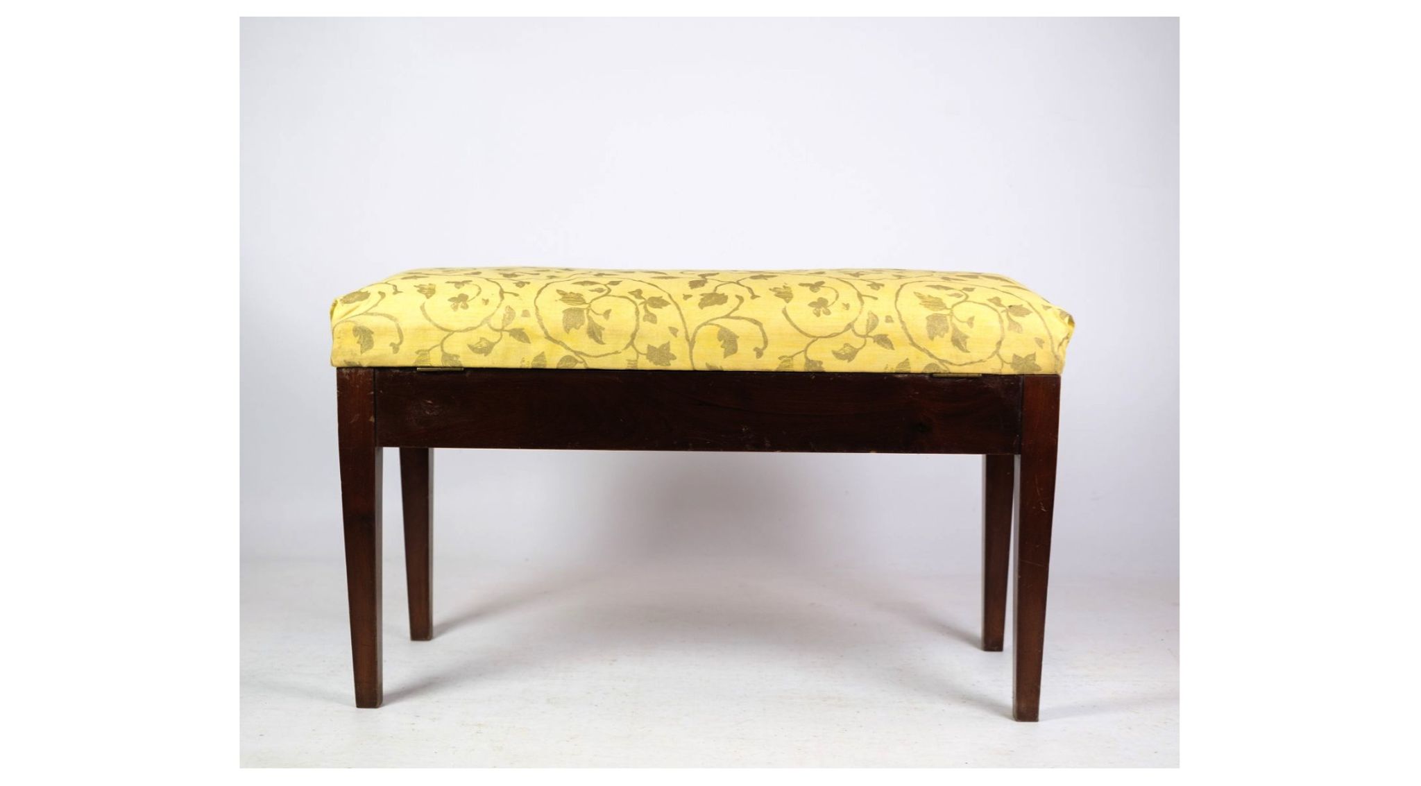 Piano bench / stool in mahogany with light floral fabric from around 1910