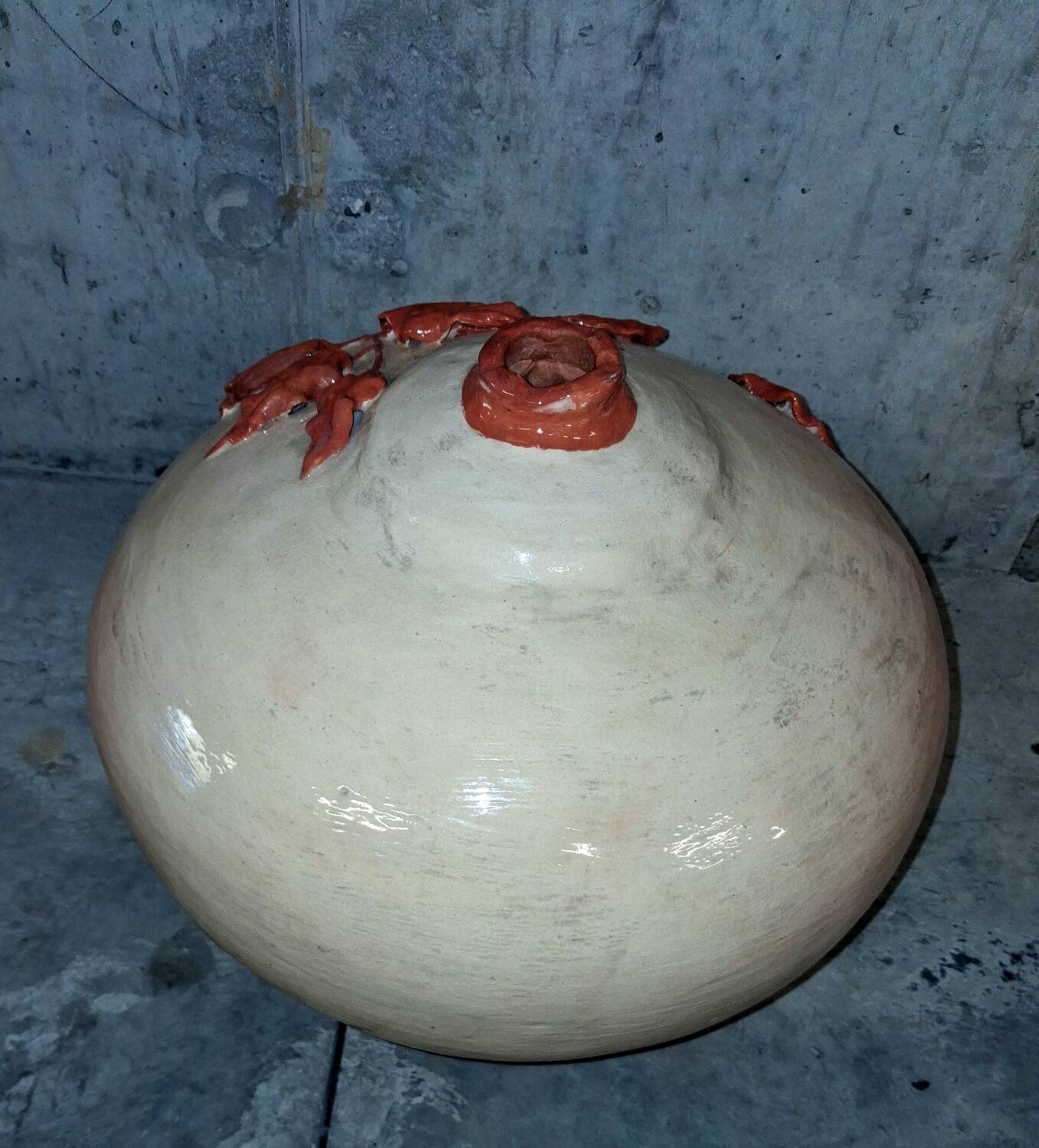 Large vase with relief plant decoration, raw art.