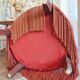 Red velvet toad armchair with fringes
