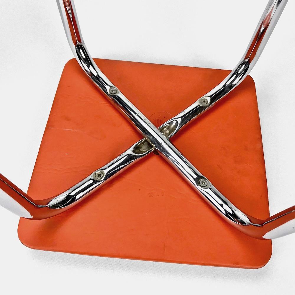 Duo of stools in orange skai and stainless feet