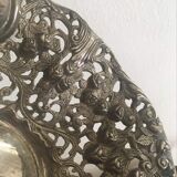 Silver metal basket with floral decoration