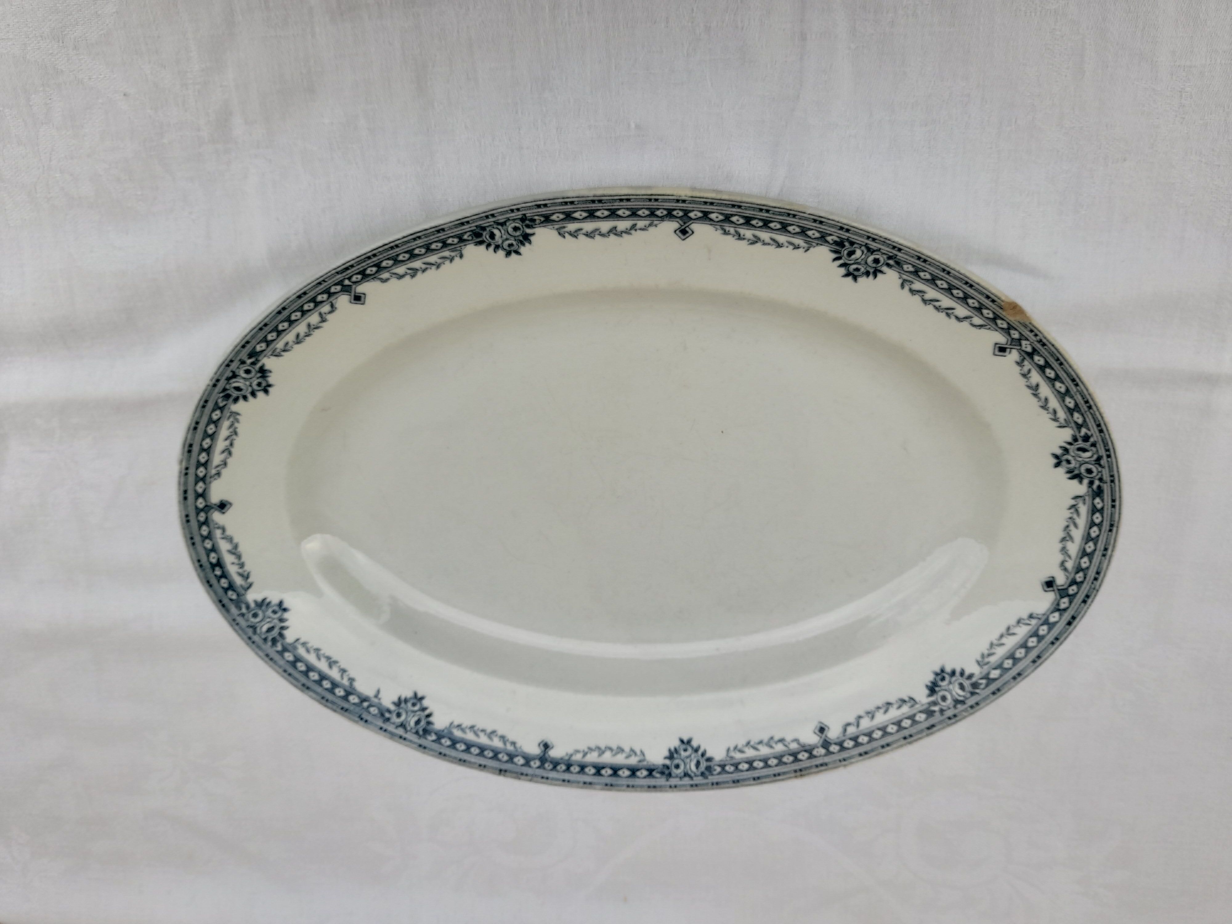 Oval dish in Earthenware of Saint Amand model turgot Iron Earth diam 35.5 cm