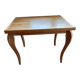 Folding game table in Louis XV style in cerused oak with cabriole legs.
