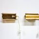 A pair of charming wall sconces/branches in brass with a star pattern, modern Scandinavian style.