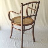 Small canned armchair; in curved wood, bistro, 1890