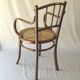 Small canned armchair; in curved wood, bistro, 1890
