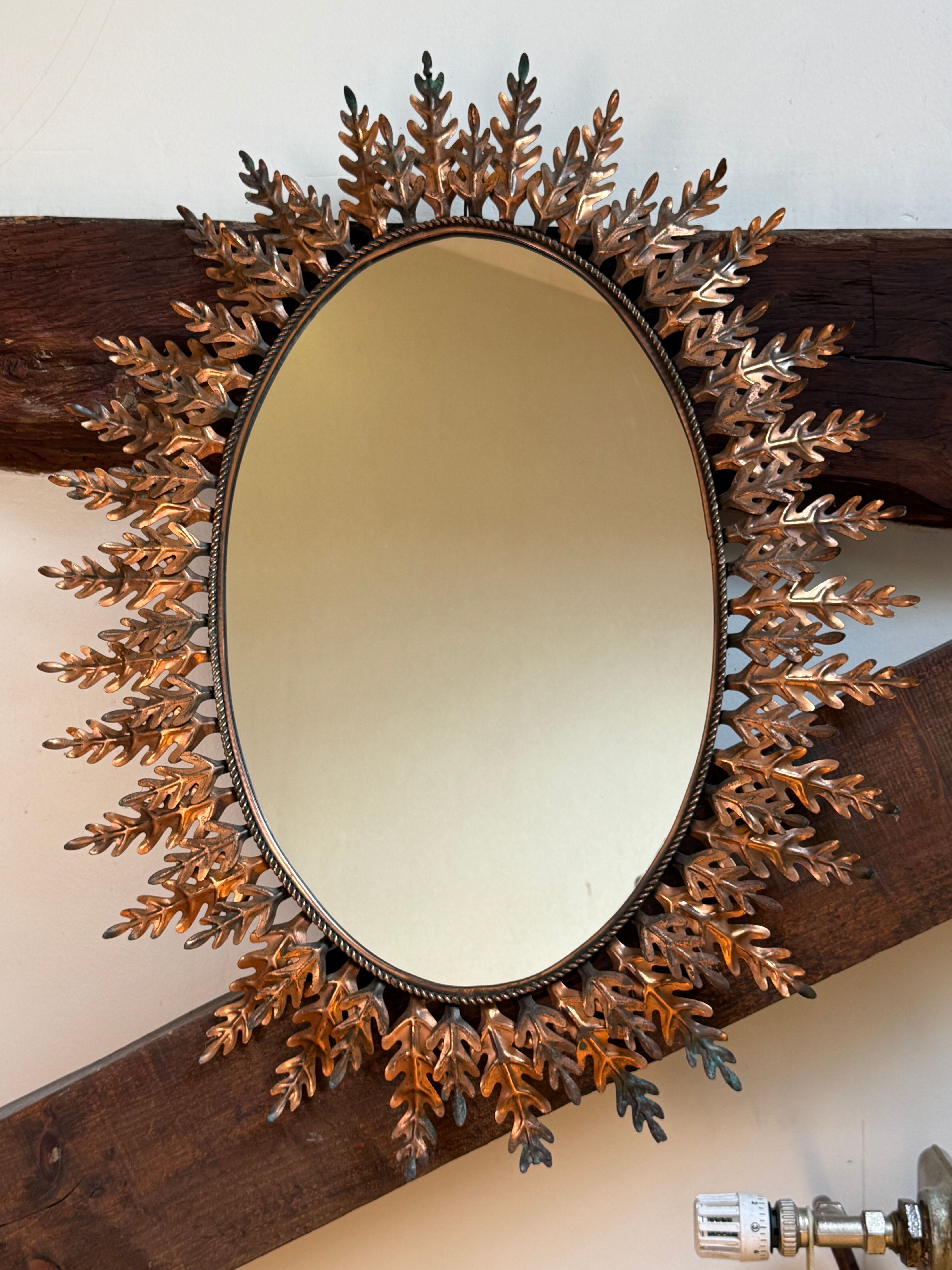 Oval sun mirror wrought iron from the 1950s Italy
