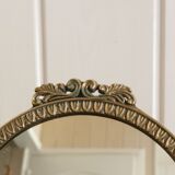 Oval mirror on psyche stand