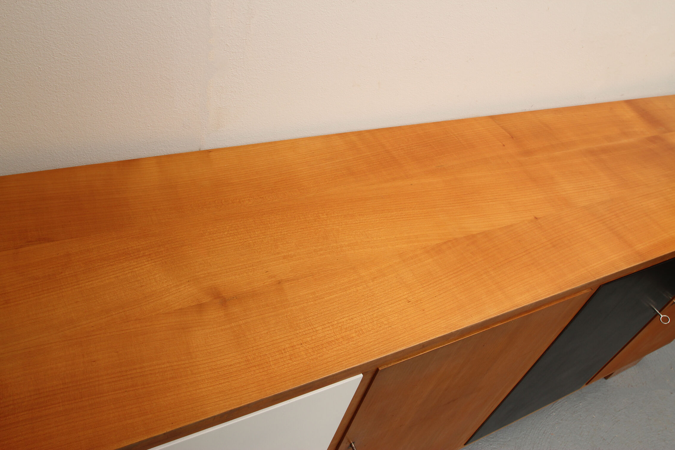 Sideboard in cherrywood with black and white doors 1950s