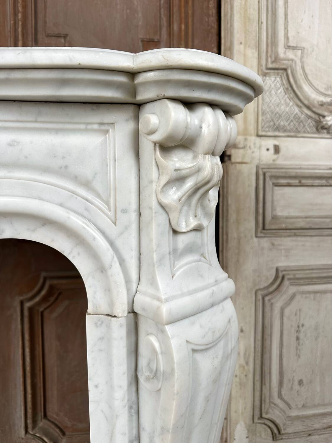 Louis XV style fireplace in white marble