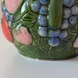 Carafe of water in slush with fruits