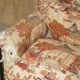 Antique Howard & Sons canapé, Aesthetic Movement, claw and ball feet, chinoiserie fabric.