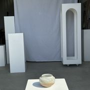 Small white ball vase tight neck in glazed speckled ceramic