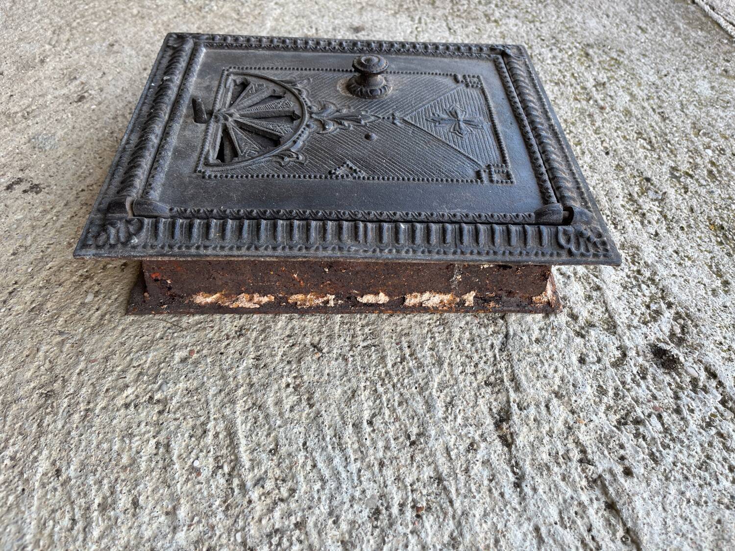 Old 19th century cast iron oven door or fireplace