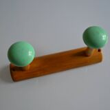 Wall coat rack with 2 hooks, wood and plastic, 60s style.