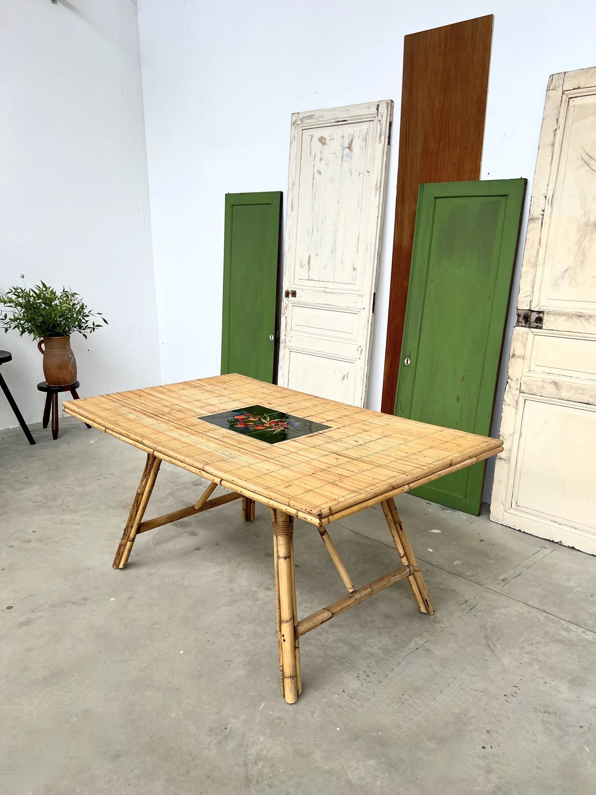 Audoux Minet bamboo rattan ceramic dining table, signed La Roue Vallauris