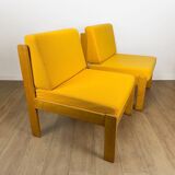 Pair of vintage Scandinavian armchairs in pine and fabric.